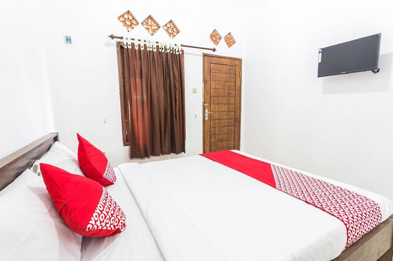 Oyo 1323 Murni Homestay Мангсит Экстерьер фото