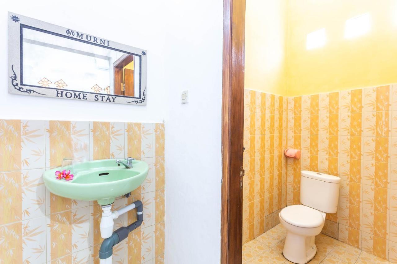 Oyo 1323 Murni Homestay Мангсит Экстерьер фото