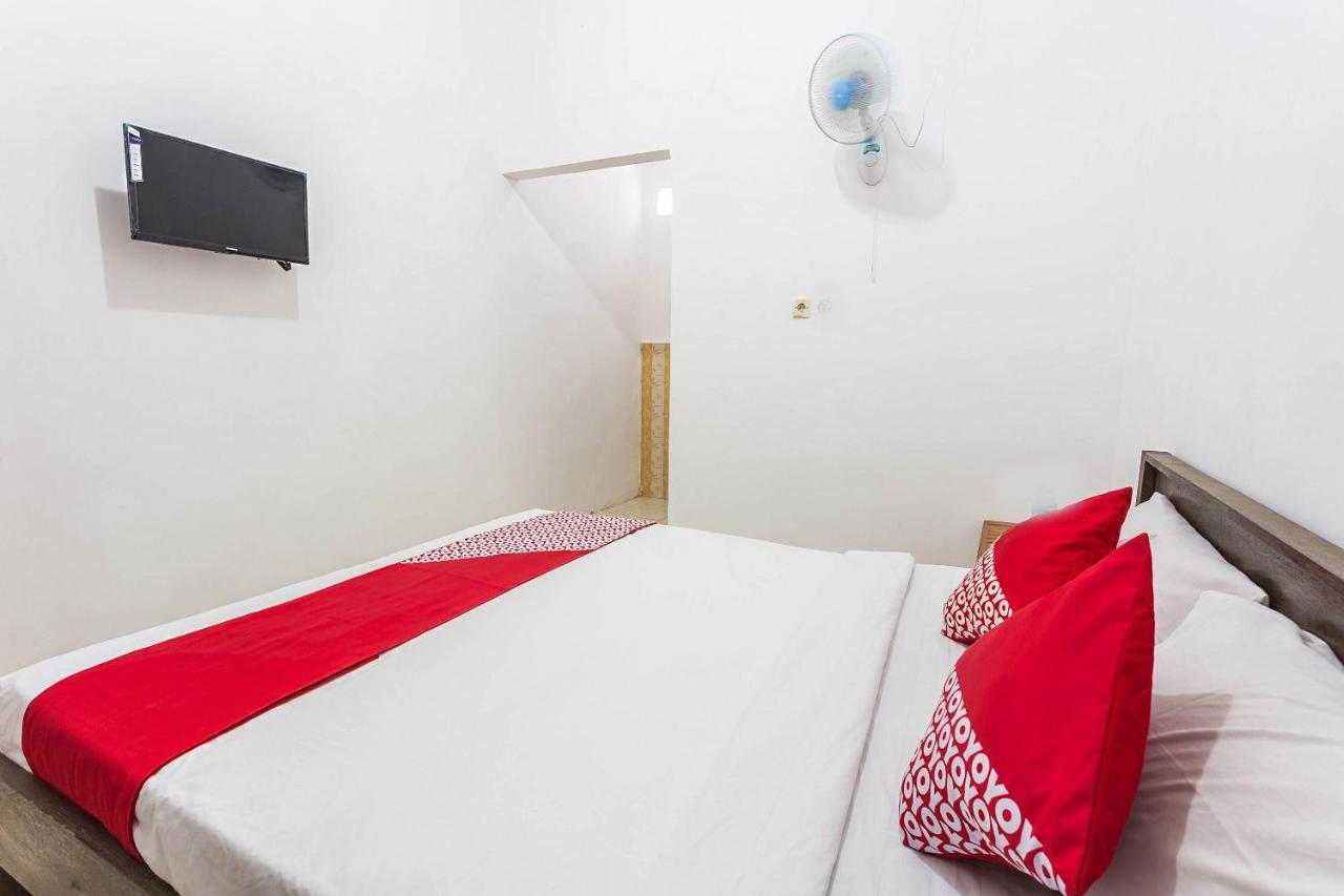 Oyo 1323 Murni Homestay Мангсит Экстерьер фото