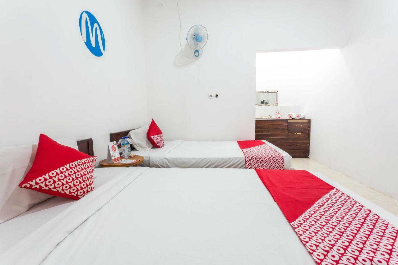 Oyo 1323 Murni Homestay Мангсит Экстерьер фото
