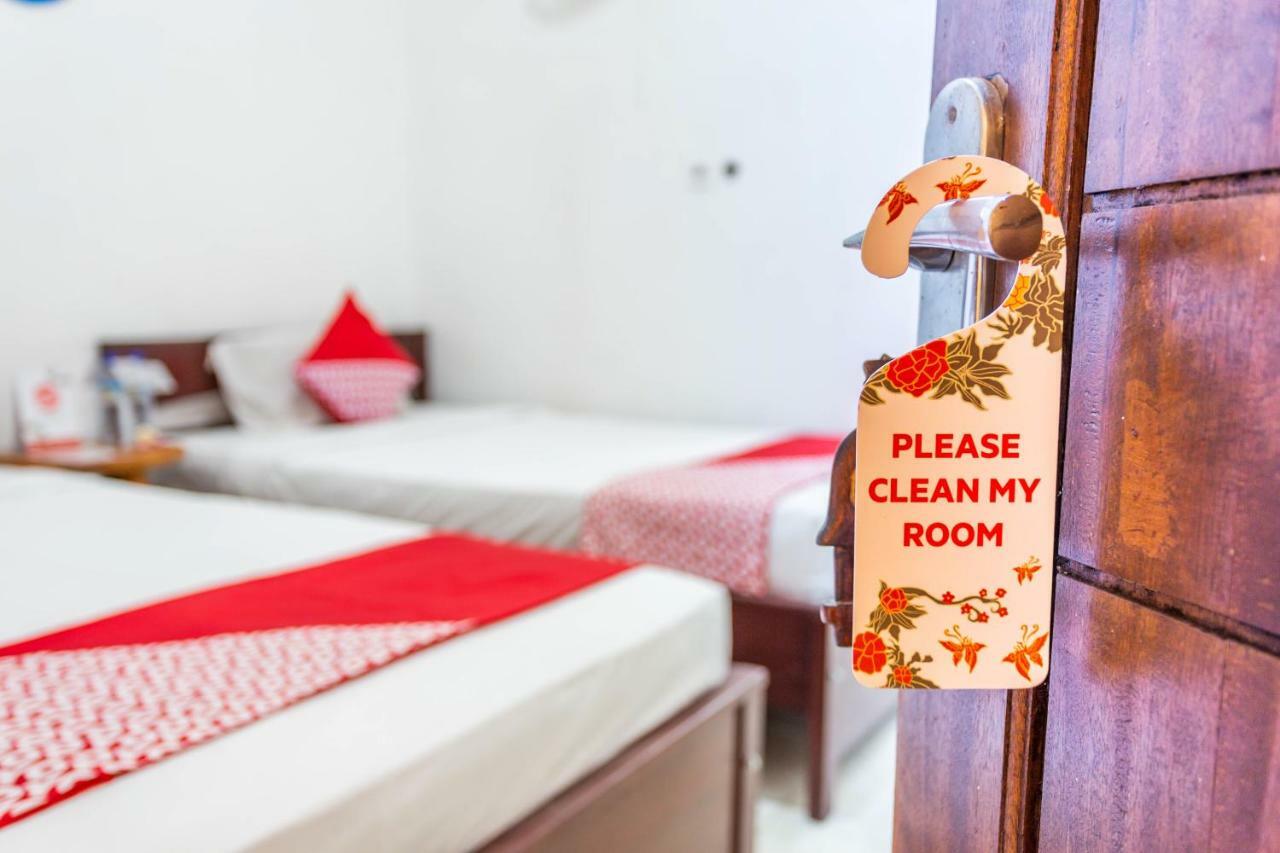 Oyo 1323 Murni Homestay Мангсит Экстерьер фото