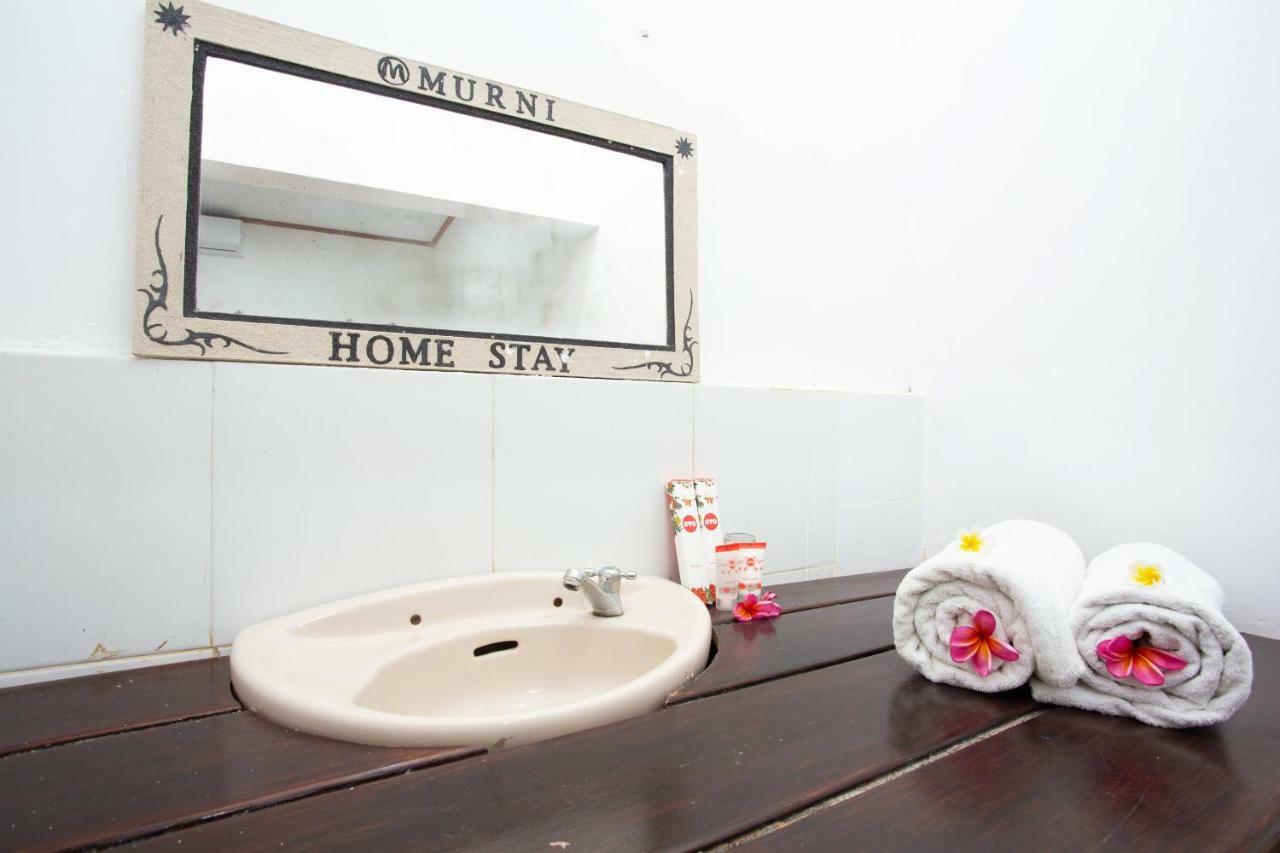 Oyo 1323 Murni Homestay Мангсит Экстерьер фото