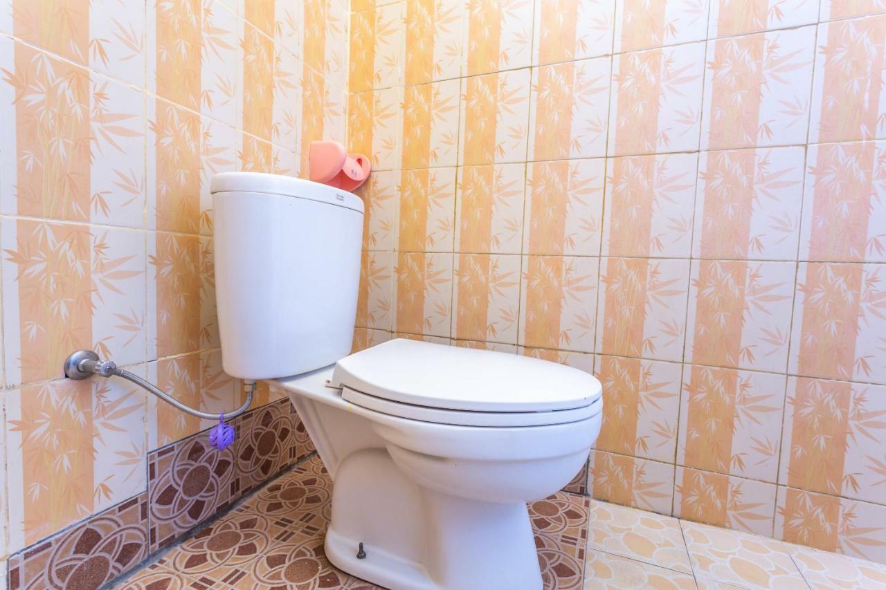Oyo 1323 Murni Homestay Мангсит Экстерьер фото